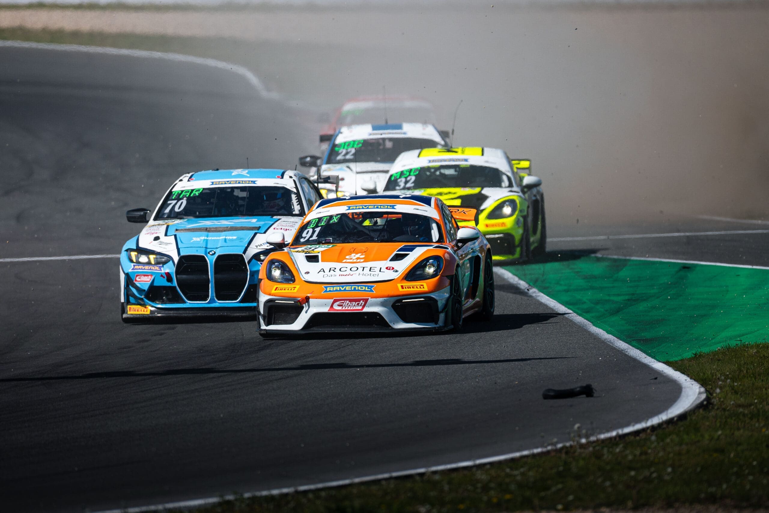 Three Cars seen racing